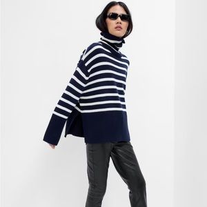blue and white split hem turtleneck
